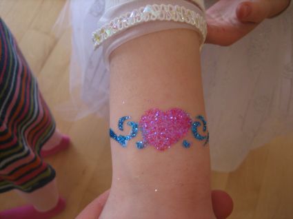 Glitter Heart And Tribal Tattoo